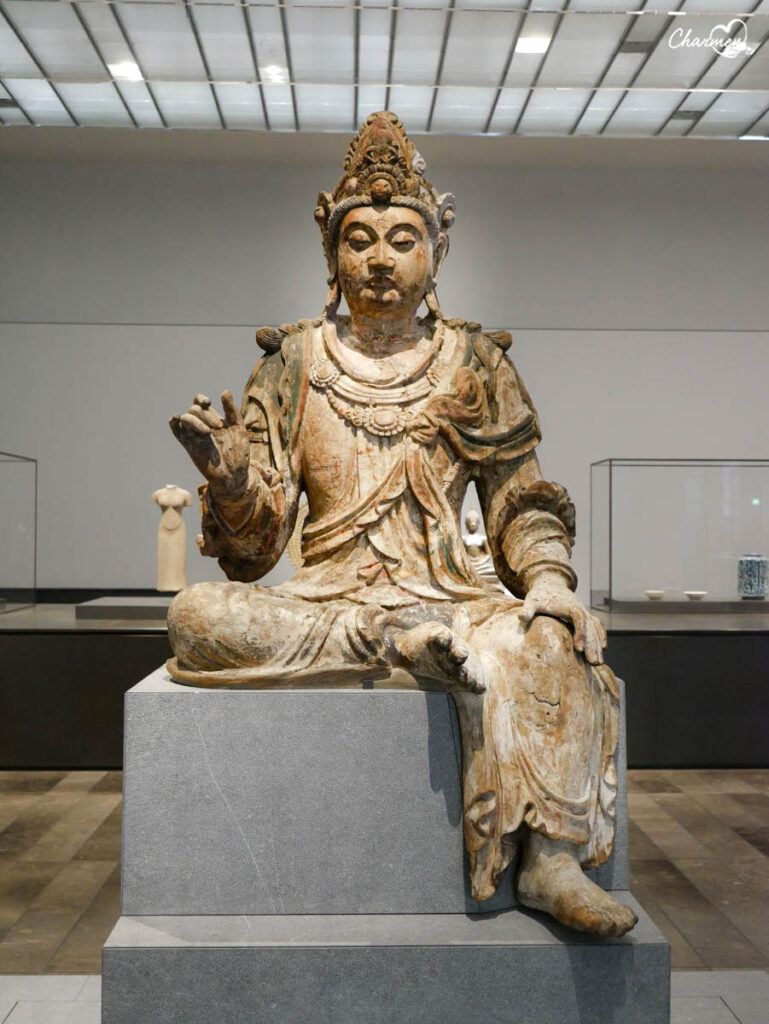Avalokiteshvara seduto (Guanyin)